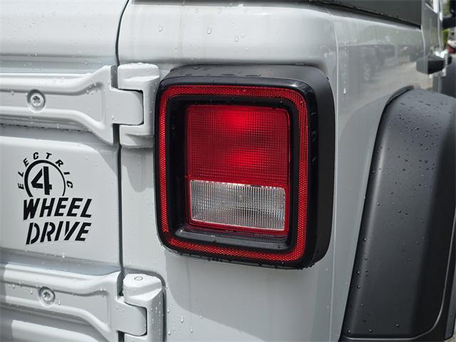 used 2023 Jeep Wrangler 4xe car, priced at $28,998