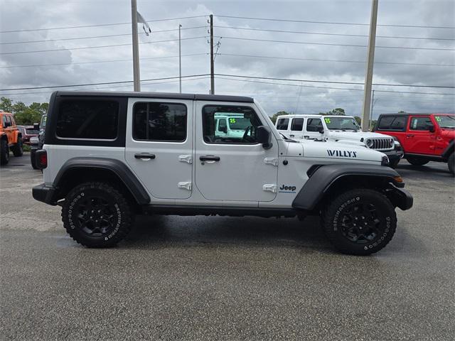 used 2023 Jeep Wrangler 4xe car, priced at $28,998