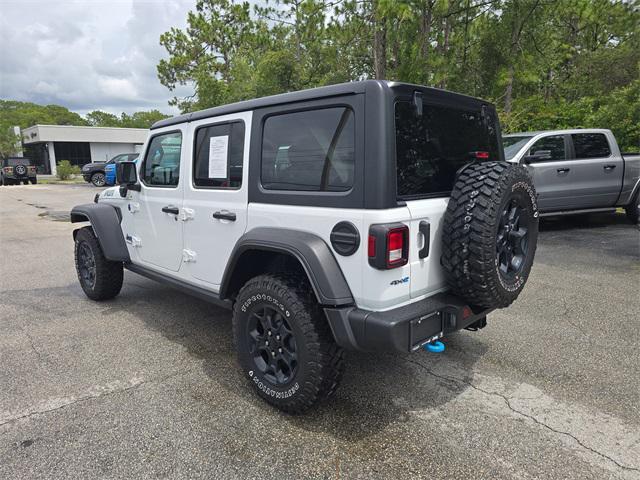 used 2023 Jeep Wrangler 4xe car, priced at $28,998