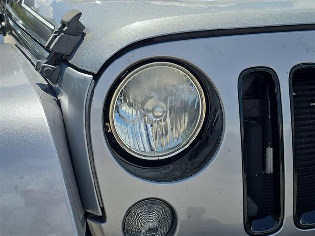 used 2014 Jeep Wrangler Unlimited car, priced at $17,947