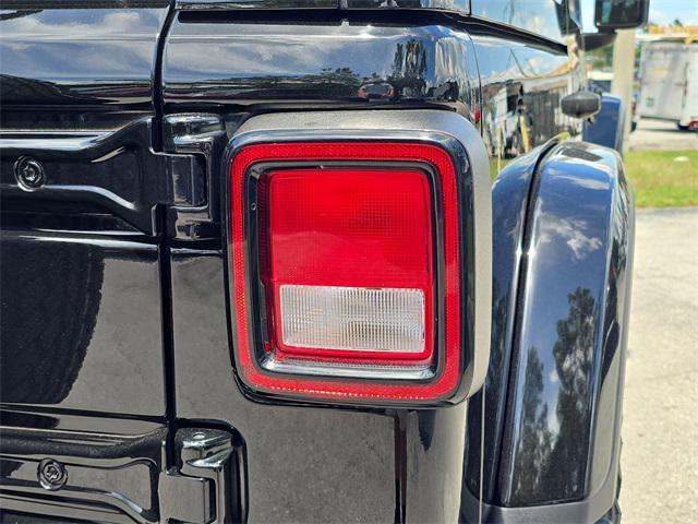 used 2021 Jeep Wrangler Unlimited car, priced at $32,689