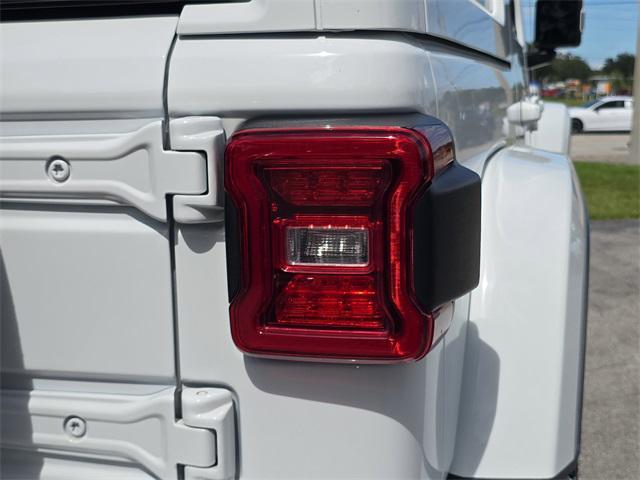used 2021 Jeep Wrangler Unlimited car, priced at $39,377