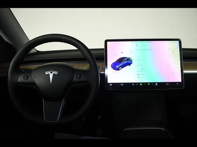 used 2024 Tesla Model Y car, priced at $34,318