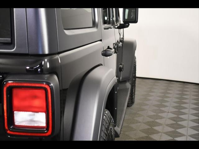 used 2021 Jeep Wrangler Unlimited car, priced at $30,366