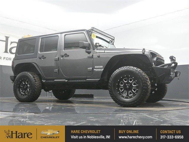 used 2016 Jeep Wrangler Unlimited car, priced at $19,455