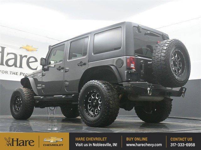 used 2016 Jeep Wrangler Unlimited car, priced at $19,455