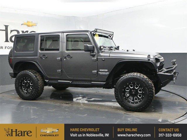 used 2016 Jeep Wrangler Unlimited car, priced at $19,455