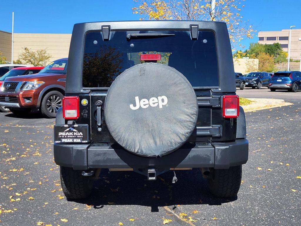 used 2014 Jeep Wrangler Unlimited car, priced at $13,598