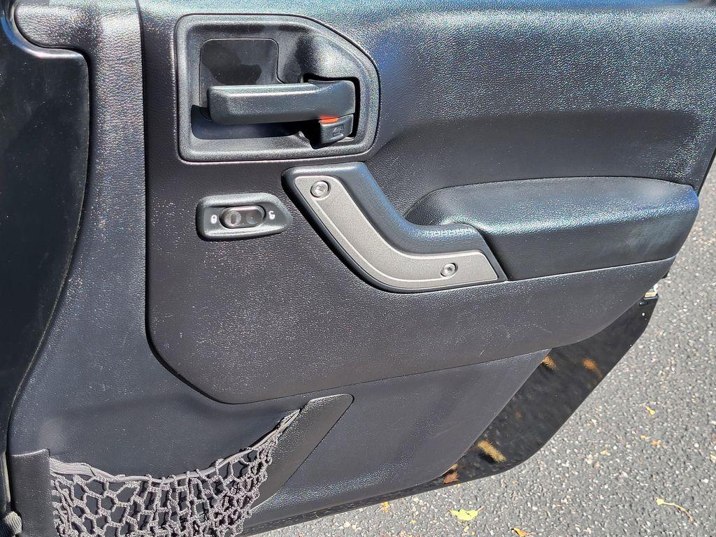 used 2014 Jeep Wrangler Unlimited car, priced at $13,598