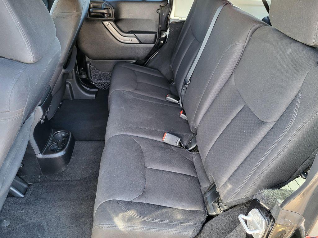 used 2014 Jeep Wrangler Unlimited car, priced at $13,598