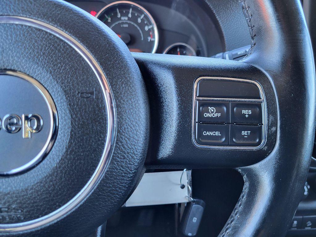 used 2014 Jeep Wrangler Unlimited car, priced at $13,598