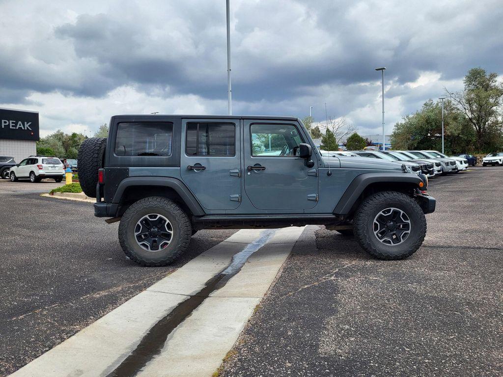 used 2015 Jeep Wrangler Unlimited car, priced at $23,998