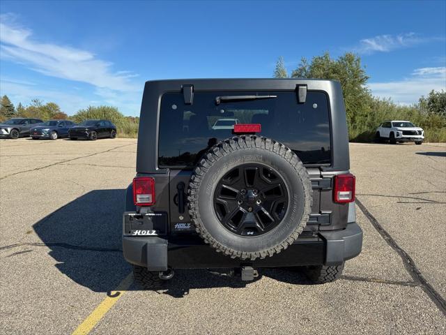 used 2014 Jeep Wrangler Unlimited car, priced at $15,622