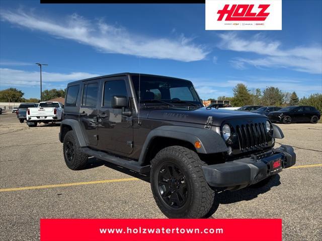 used 2014 Jeep Wrangler Unlimited car, priced at $15,622