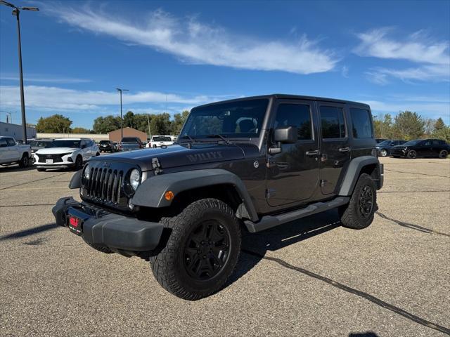 used 2014 Jeep Wrangler Unlimited car, priced at $15,622