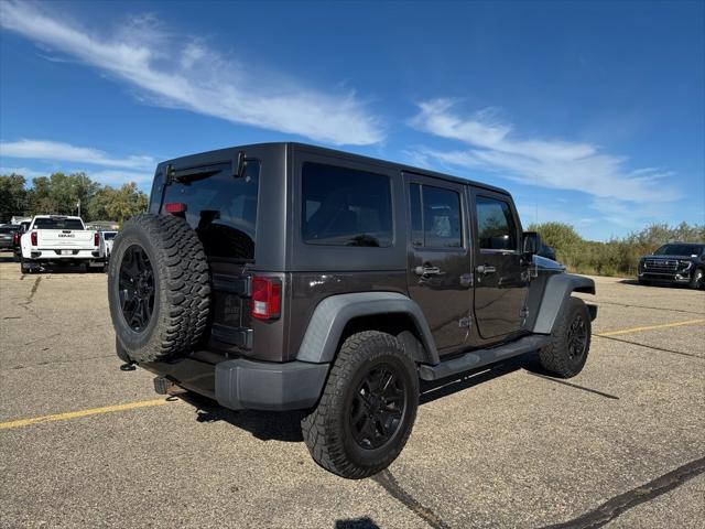 used 2014 Jeep Wrangler Unlimited car, priced at $15,622