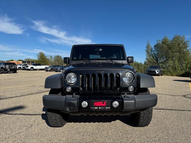 used 2014 Jeep Wrangler Unlimited car, priced at $15,622