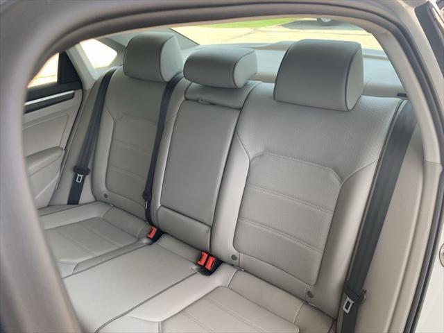 used 2016 Volkswagen Passat car, priced at $10,000