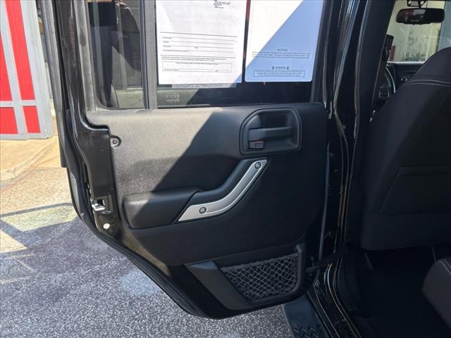 used 2013 Jeep Wrangler Unlimited car, priced at $18,987