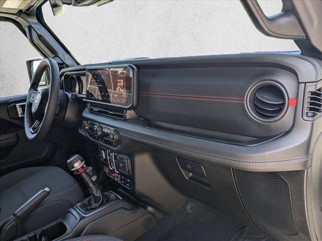 used 2024 Jeep Wrangler car, priced at $40,634