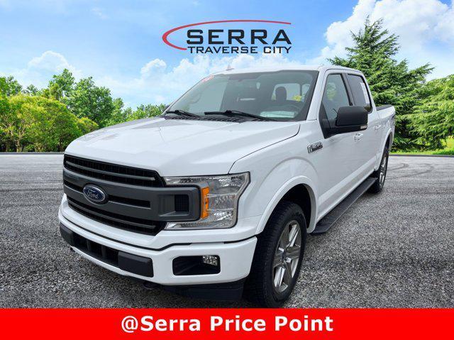 used 2018 Ford F-150 car, priced at $23,411