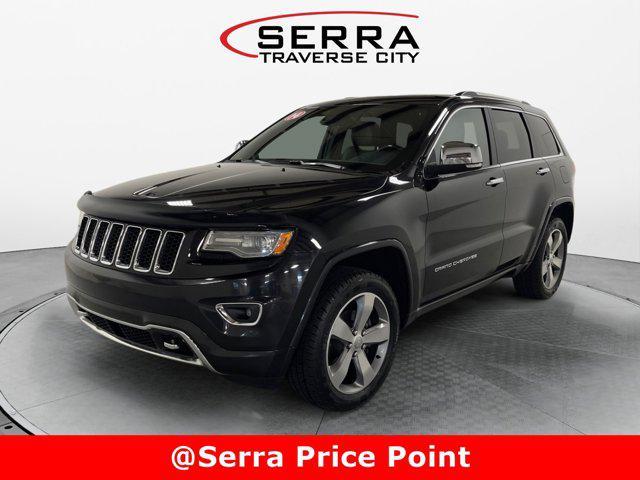 used 2014 Jeep Grand Cherokee car, priced at $14,779