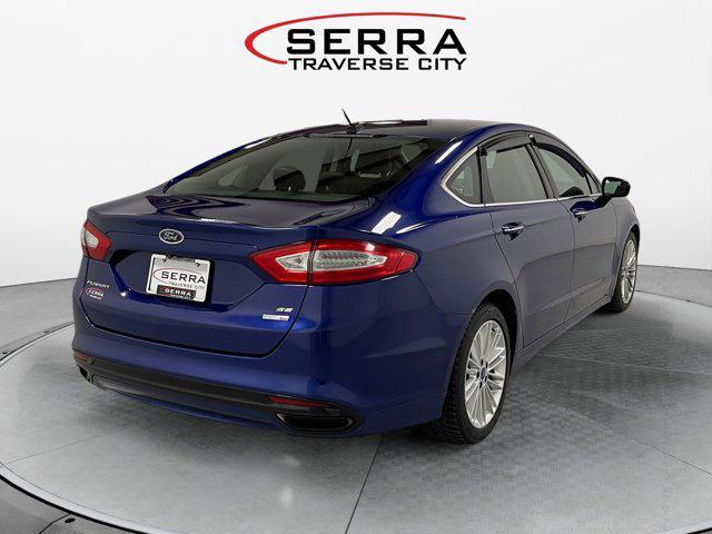 used 2015 Ford Fusion car, priced at $6,922