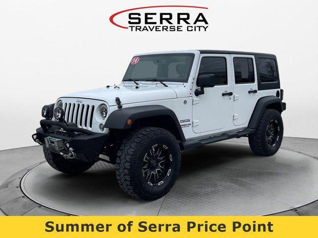used 2014 Jeep Wrangler Unlimited car, priced at $14,750