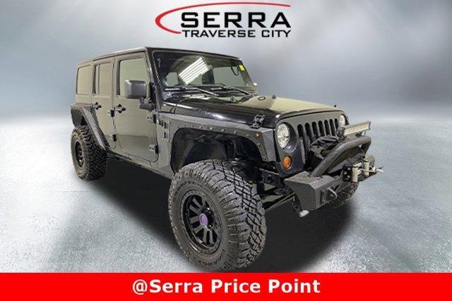 used 2012 Jeep Wrangler Unlimited car, priced at $12,700