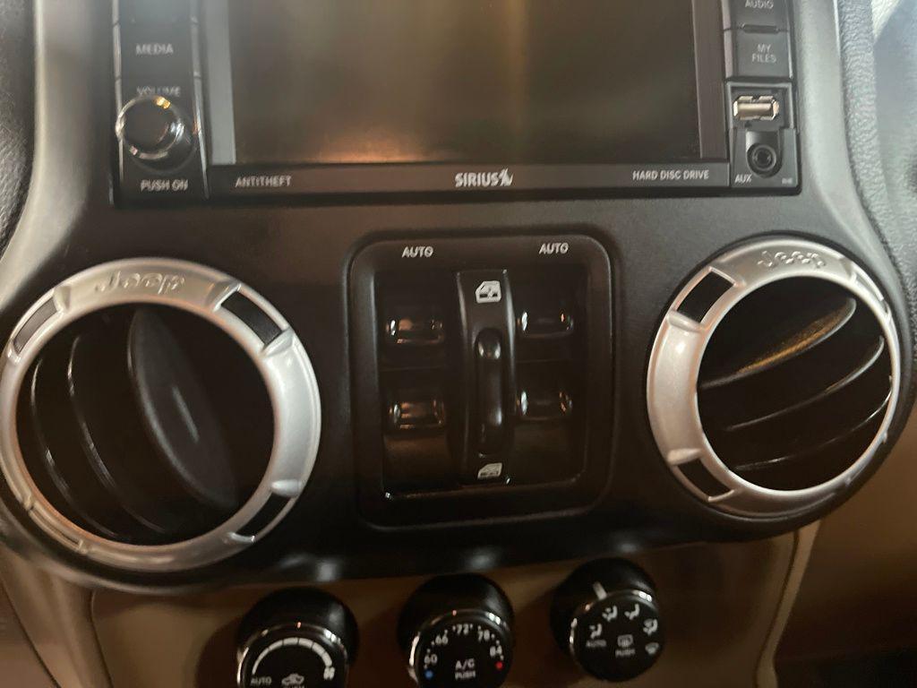 used 2016 Jeep Wrangler Unlimited car, priced at $16,922