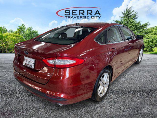 used 2014 Ford Fusion car, priced at $6,911