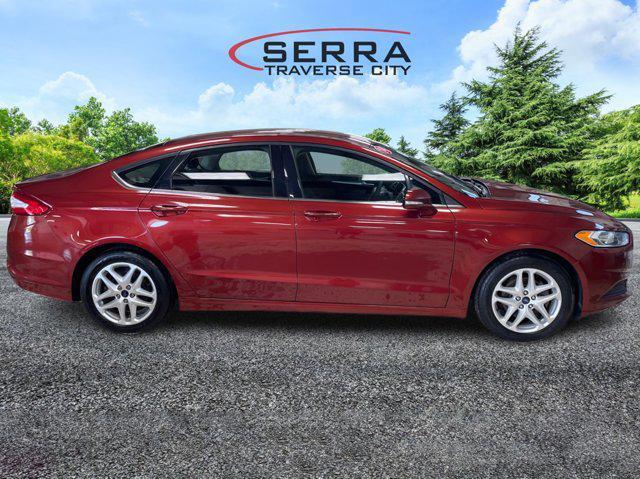 used 2014 Ford Fusion car, priced at $6,911