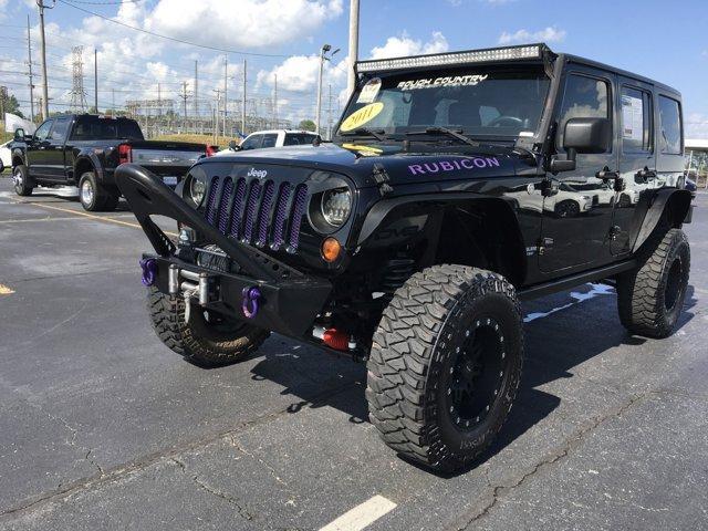 used 2011 Jeep Wrangler Unlimited car, priced at $15,471