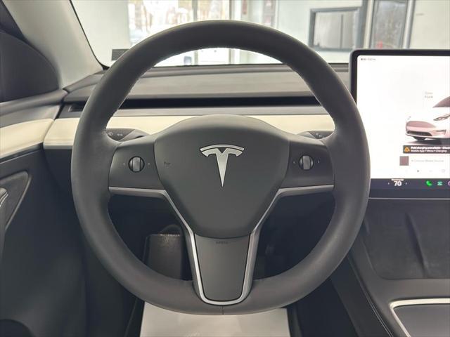 used 2023 Tesla Model Y car, priced at $34,995