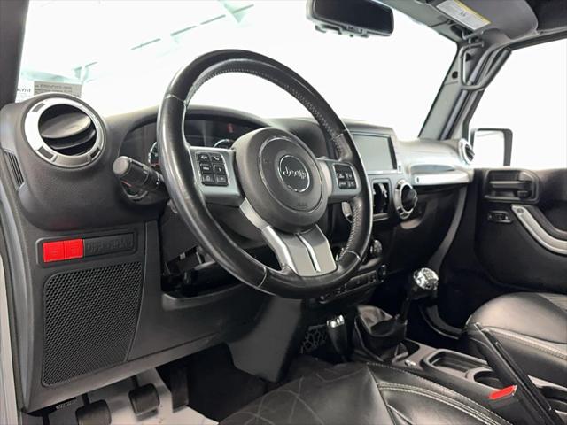 used 2015 Jeep Wrangler Unlimited car, priced at $21,495