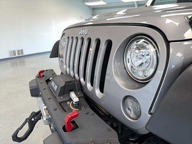 used 2015 Jeep Wrangler Unlimited car, priced at $21,495