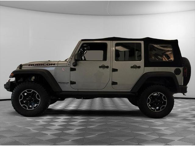 used 2015 Jeep Wrangler Unlimited car, priced at $21,495