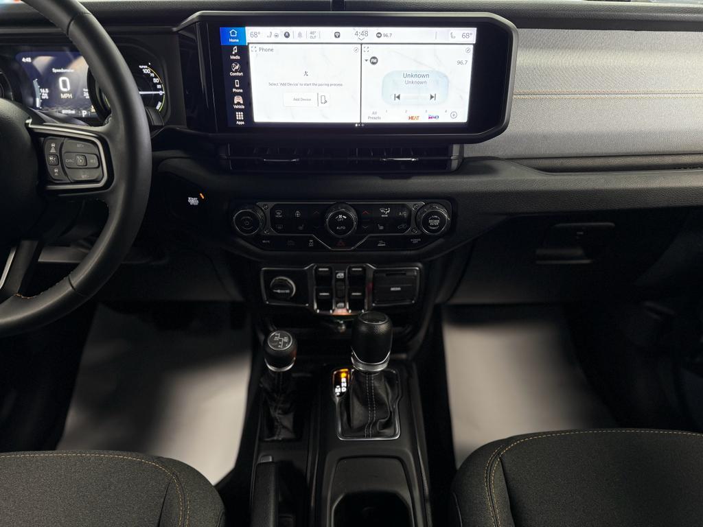 used 2024 Jeep Wrangler 4xe car, priced at $33,995