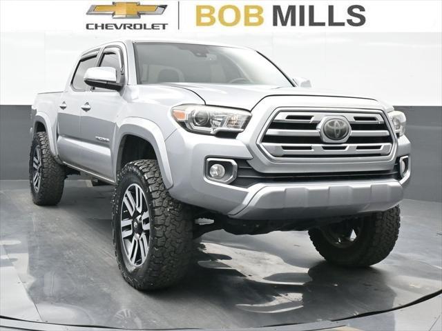 used 2018 Toyota Tacoma car, priced at $29,307