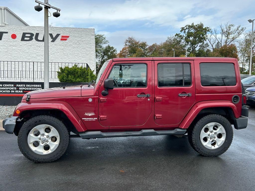 used 2013 Jeep Wrangler Unlimited car, priced at $15,995