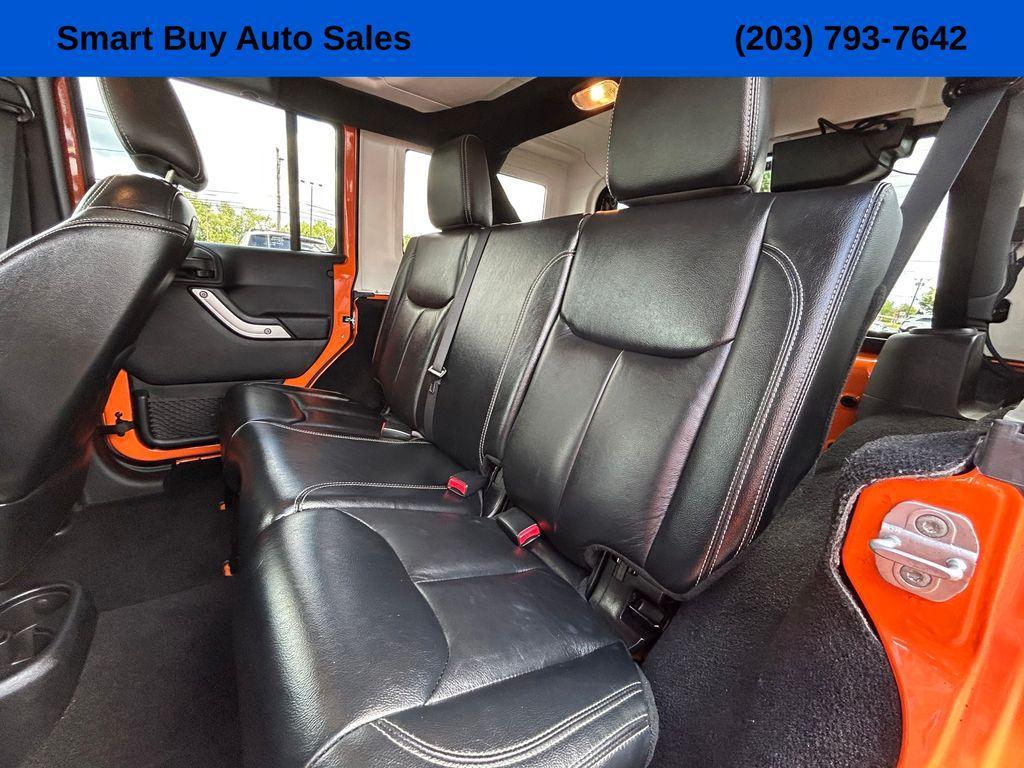 used 2013 Jeep Wrangler Unlimited car, priced at $17,177