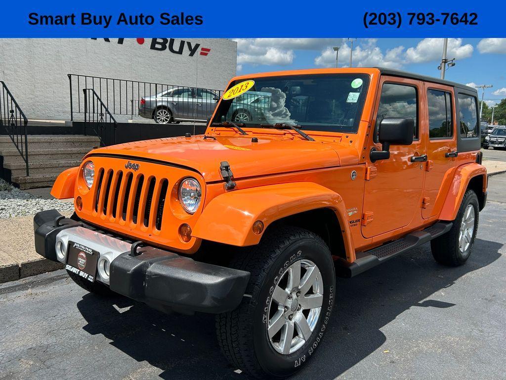used 2013 Jeep Wrangler Unlimited car, priced at $17,177