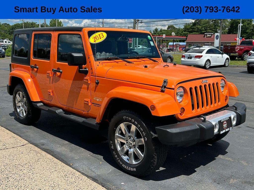 used 2013 Jeep Wrangler Unlimited car, priced at $17,177