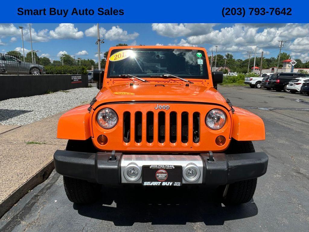 used 2013 Jeep Wrangler Unlimited car, priced at $17,177