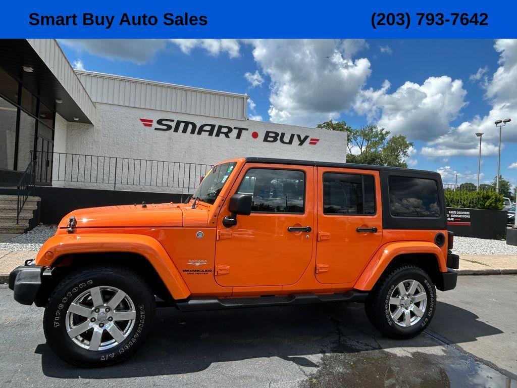 used 2013 Jeep Wrangler Unlimited car, priced at $17,177