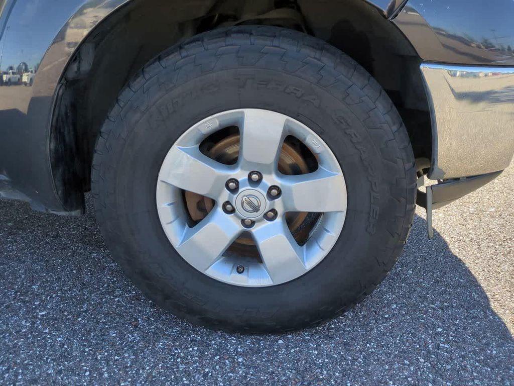 used 2010 Nissan Frontier car, priced at $9,999