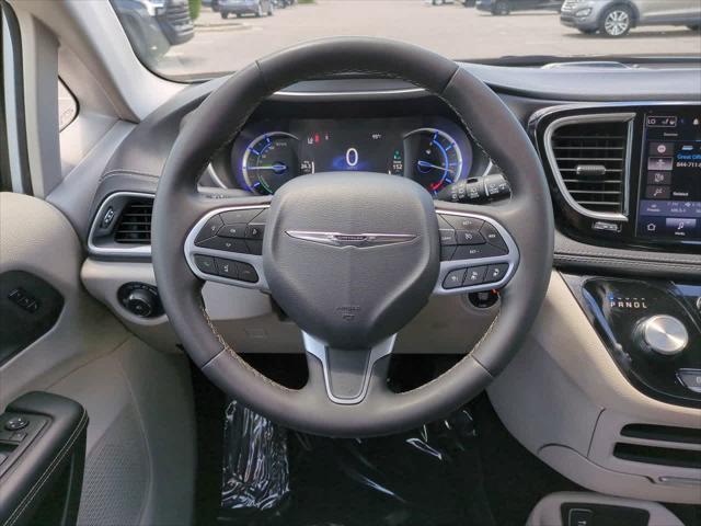 used 2024 Chrysler Pacifica Hybrid car, priced at $27,444
