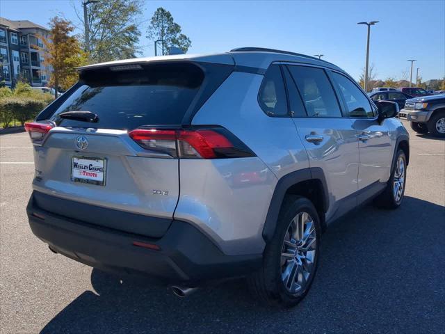 used 2021 Toyota RAV4 car, priced at $28,244