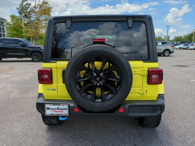 used 2023 Jeep Wrangler 4xe car, priced at $30,999