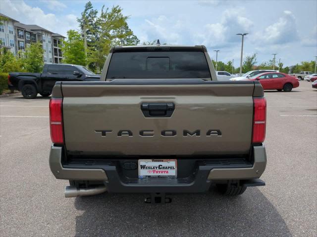 used 2025 Toyota Tacoma car, priced at $47,999